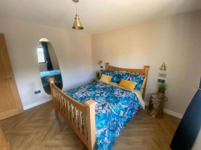 One bed modern detached holiday home - off street parking